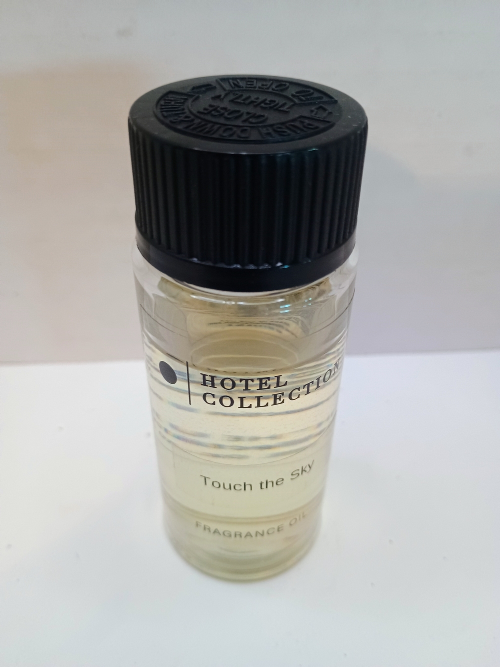 Hotel Collection Touch the Sky Fragrance Oil - Black Cap, Clear Liquid